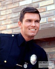 KENT McCORD AS OFFICER JIM REED IN 