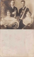 Vintage RPPC - 1910 - Mixed brass quartet - Trumpet, tuba, trombone, mellophone picture