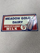 MCM Meadow Gold Dairy Chocolate Flavored Milk Embossed Metal Sign 15