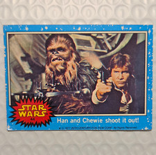 Topps 1977 Star Wars Base Set #44 Han and Chewie shoot it out Card picture