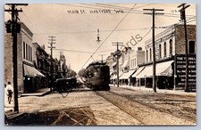 K67/ Hartford Wisconsin RPPC Postcard c1910 Main Street Trolley Stores 324 picture
