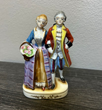 Vintage Made in Occupied Japan Porcelain Figurine Colonial Couple Flower Basket picture