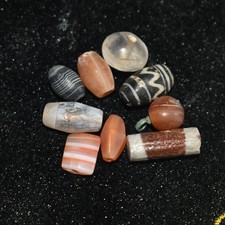 9 Ancient Central Asian Banded Carnelian Crystal & Glass Bead Lot picture