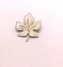 Vintage white enamel and gold leaf brooch picture