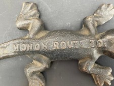 Vintage Cast Iron MONON ROUTE TO Alligator Railroad Advertising Paperweight picture