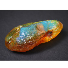 Genuine orange blue rough specimen Dominican amber 53mm picture