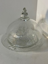 Jeannette Glass butter dish features a clear, pressed glass design picture