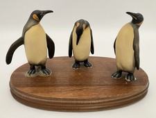 Vintage Attributed ANRI Toriart Emperor Penguin Trio Sculpture on Wood Base picture