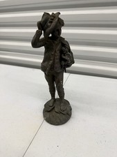 Antique bronze statue of a fisherman boy signed by the French artist Rousseau. picture