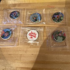 6 Factory Sealed Lucky Charms Collectible Cereal Pogs 1995 New in Packages Mint picture