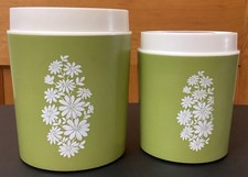 2 Vtg Mid Century Avocado Green/White Crazy Daisy Floral Plastic Canisters picture