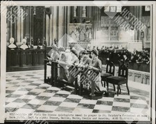 2025 Dionne quintuplets kneel in prayer in St. Patrick's Cathedral at mass here picture