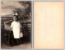 Vintage RPPC Little Girl Studio Portrait Bow Dress Real Photo Postcard picture