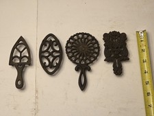 Vintage lot of 4 miniature cast iron trivets, iron stands, toy; salesman samples picture