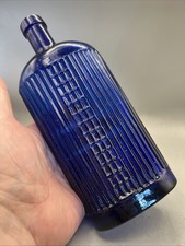 NICE VICTORIAN OVAL SHAPED BLUE GLASS POISON BOTTLE WITH EMBOSSED WARNING LINES picture