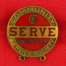 Vintage COMMUNITY SERVICE SOCIETY Pin RED ENAMEL SERVE VOLUNTEER Goldtone Pin picture