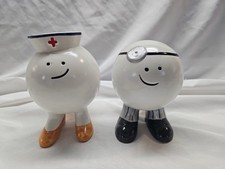 2 Vintage 1976 Enesco Ceramic Coin Bank Figurines Dr. And Nurse picture