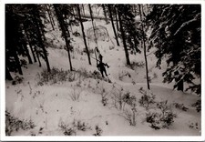 Skier on Vintage Chairlift over Snowy Woods, 1950s B&W Snapshot Photo picture