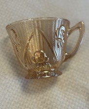 Jeannette Iris & Herringbone Marigold Handled Footed Cup 4 oz Carnival Glass picture