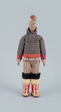 Greenlandica. Woman wearing Greenlandic dress. Made of wood and fabric. picture