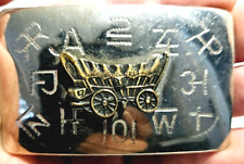 CHAMBERS BELT CO Pioneer wagon and characters Belt Buckle picture
