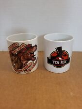 Set of 2 Jurassic Park Tea-Rex & Dinosaurs Eats Man-Coffee Tea Cups picture