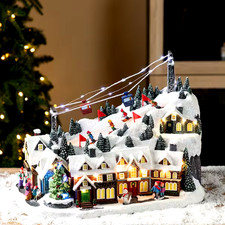 11.5 in. H Christmas Oversized Resin Lighted Musical Skiing Christmas Village picture
