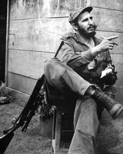 1959 FIDEL CASTRO Sitting with Rifle Historic Revolutionary Picture Photo 4x6 picture