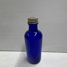 vintage cobalt blue glass medicine bottle made by Sharp & Dohme picture