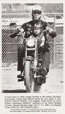 1983 Press Photo Hells Angels Alan Mahon Drives Harley Davidson with His Son picture
