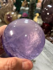 Purple flourite  sphere  with phantoms on stand 3.33” picture