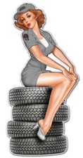 PINUP GIRL SITTING ON CAR TIRES 24