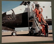 1989 NASA Photo Space Shuttle Atlantis STS-34 Crew Egress Orange Suits 8x10 picture