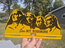 Vintage See Mount Mt. Rushmore Memorial Metal License Plate Topper Souvenir picture