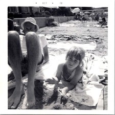 Father and Daughter Relaxing on Balboa Island Beach, 1970 B&W Snapshot Photo picture