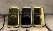 Vintage Camel Cigarettes Lighters Lot of 2 1990's Rounded Gold Silver Joe Camel picture