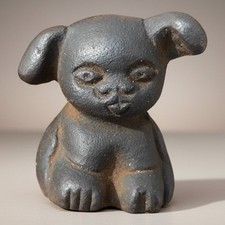 Griswold Pup Cast Iron Advertising Paperweight picture