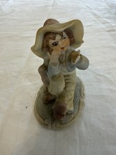 Ceramic Seated Girl Figurine Wearing Bonnet Hat, Matte Finish, Beige Blue picture