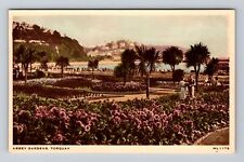 Torquay England, English Channel, Couple Admiring Abbey Gardens Vintage Postcard picture