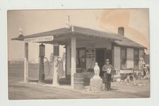 Vintage RPPC: WHITE EAGLE GASOLINE STATION, OWNER PLAYING ACCORDION picture