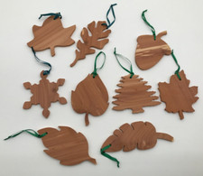 Lot of 9 Christmas Ornaments Cedar Wood Leaves (7) Acorn (1) & Snowflake (1) picture