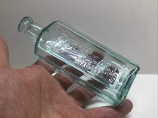 Antique Boots Cash Chemist Cork Top Paneled Medicine Bottle. picture