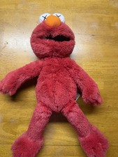 Uniqlo x KAWS Sesame Street Plush Elmo  picture