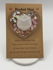 Pocket Hug With Flowers And A Sand Dollar picture
