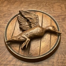 VINTAGE 3D molded flying mallard duck mounted on a circular, wood-grain plaque. picture
