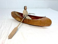 Antique hand carved wood Canadian Inuit eskimo art wood sculpture canoe man  picture