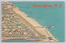 Postcard Aerial view of the beach front and boardwalk AT OCEAN GROVE, N. J. picture