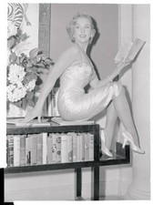 Leigh Snowden Sitting with Book 1955 Photo - Sex appeal isn't all Leigh Snowden picture