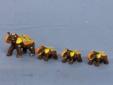 Vintage Brown Circus Elephant Figurines Set of 4 Hand Painted 1934 Estate picture