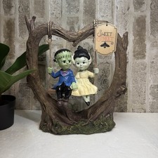 VIRAL Sweet Street Frankenstein & Bride on Heart Shaped Tree Swing Halloween picture
